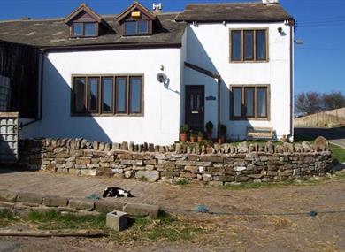 Cosy and homely farmhouse has stunning views